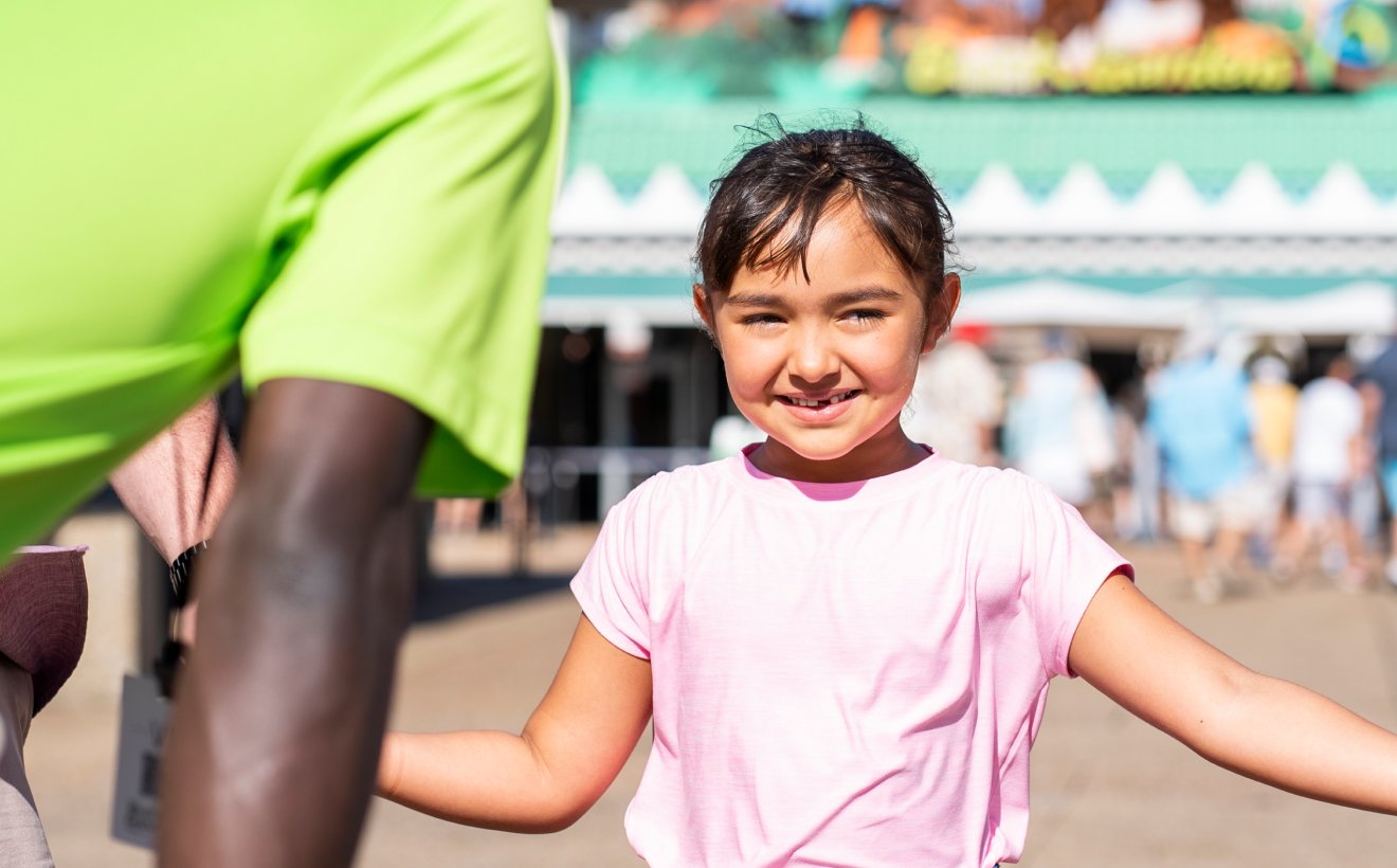 Little girl hi-fiving tour guide